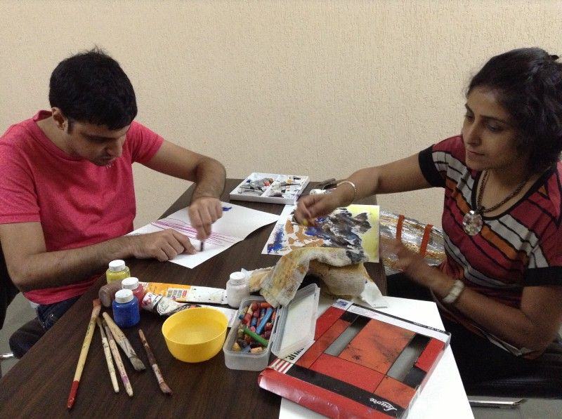 Autistic child artist with Ami Patel