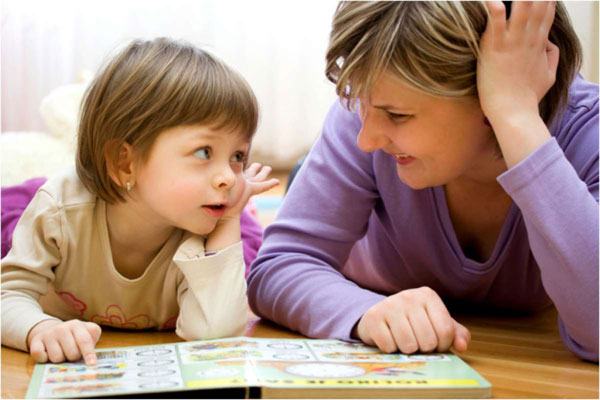 mother-and-young-child-looking-at-book